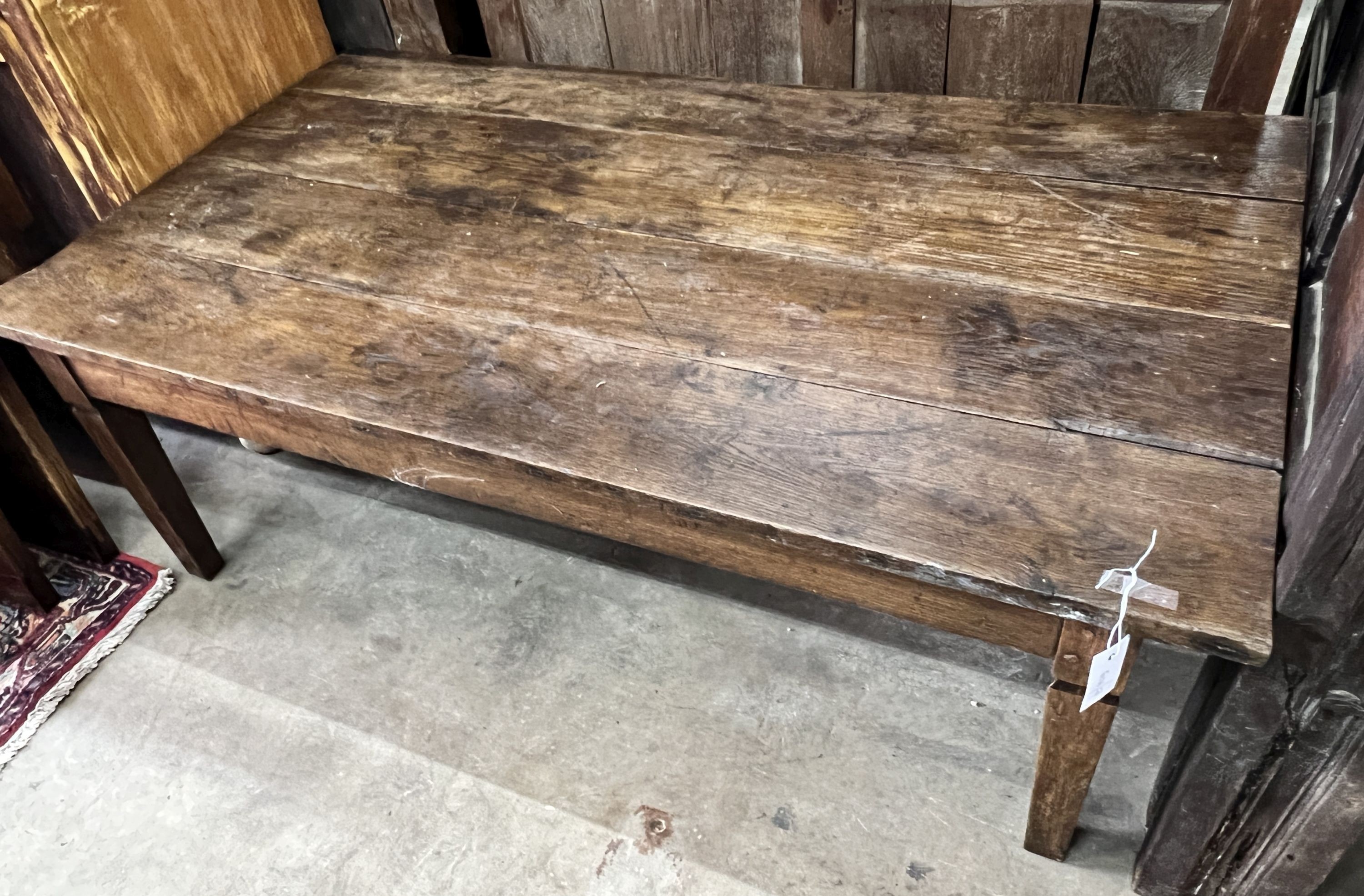 A 19th century French rectangular oak coffee table, length 134cm, depth 76cm, height 48cm (cut down dining table)